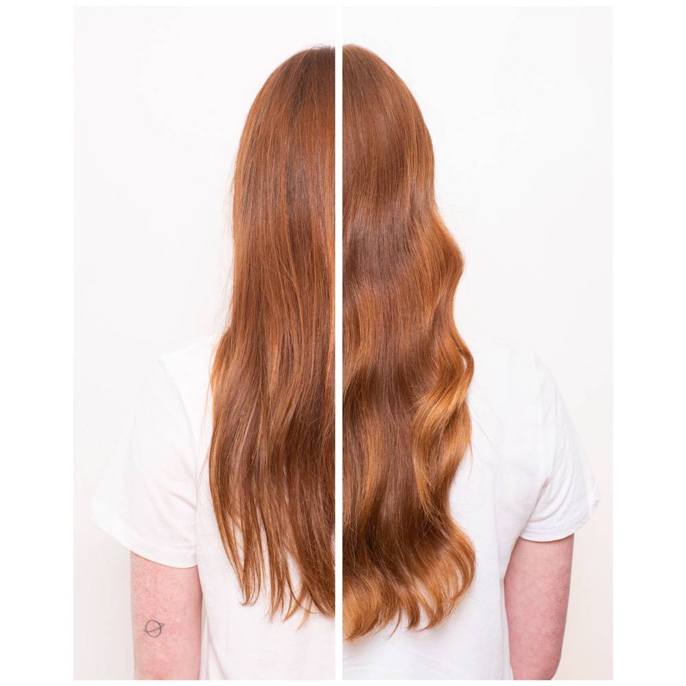 Anwendung des Essence Absolue Reiseöls in den Spitzen – geschmeidiges, gepflegtes Haar